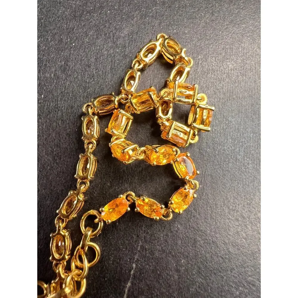 Yellow spessartine garnet tennis bracelet in gold over sterling silver